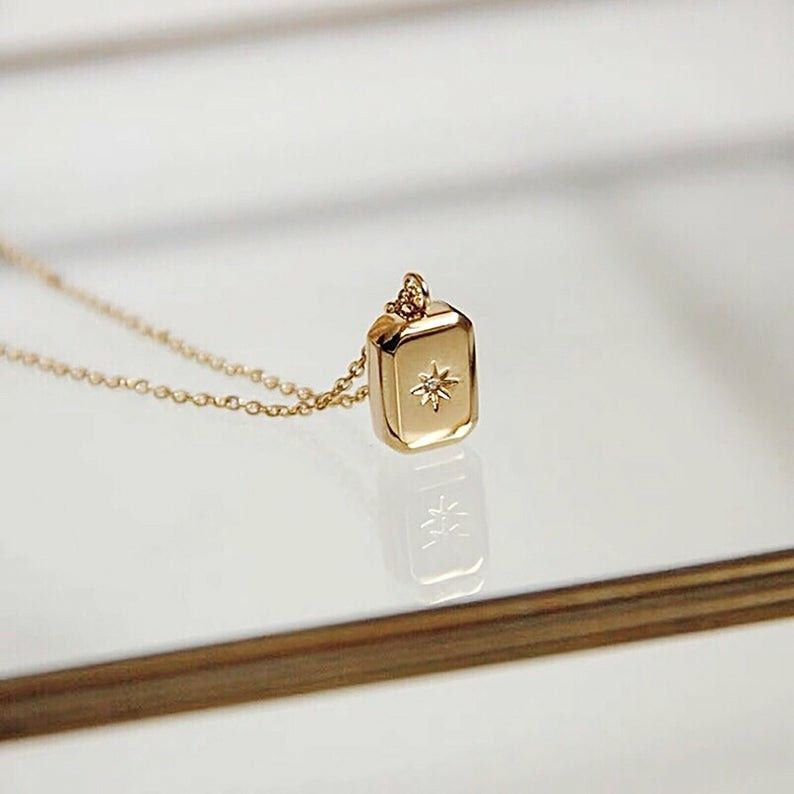 SUN EMBLEM NECKLACE