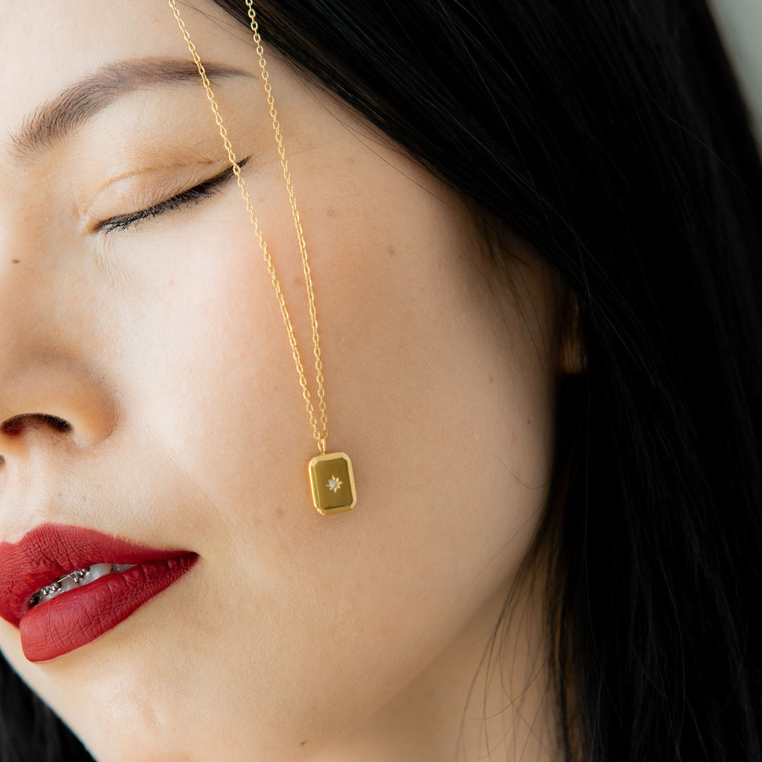 SUN EMBLEM NECKLACE