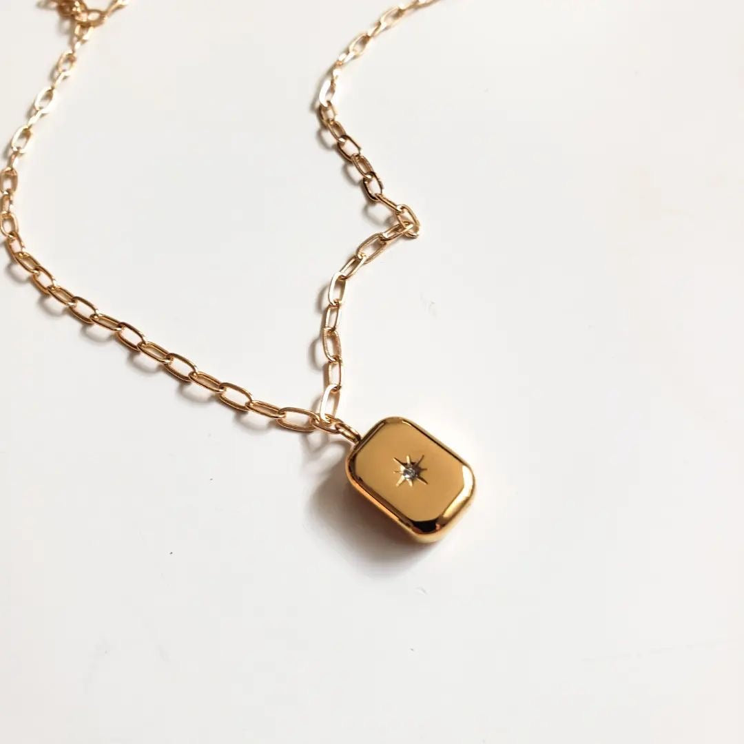 SUN EMBLEM NECKLACE